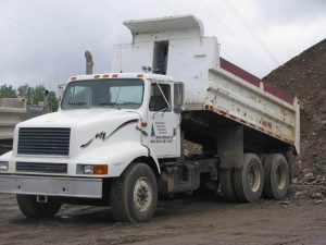 white truck dumping